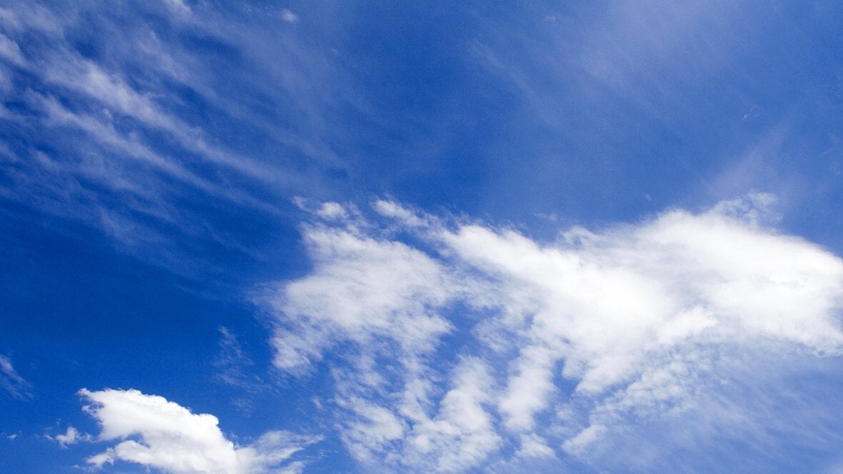 A picture of a blue sky with white clouds.