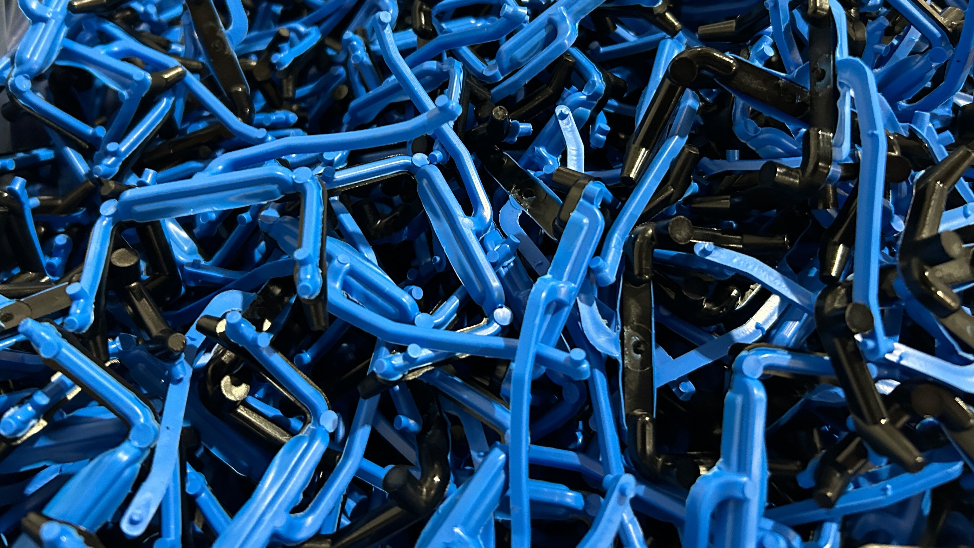 Plastics are ground and reused in production.