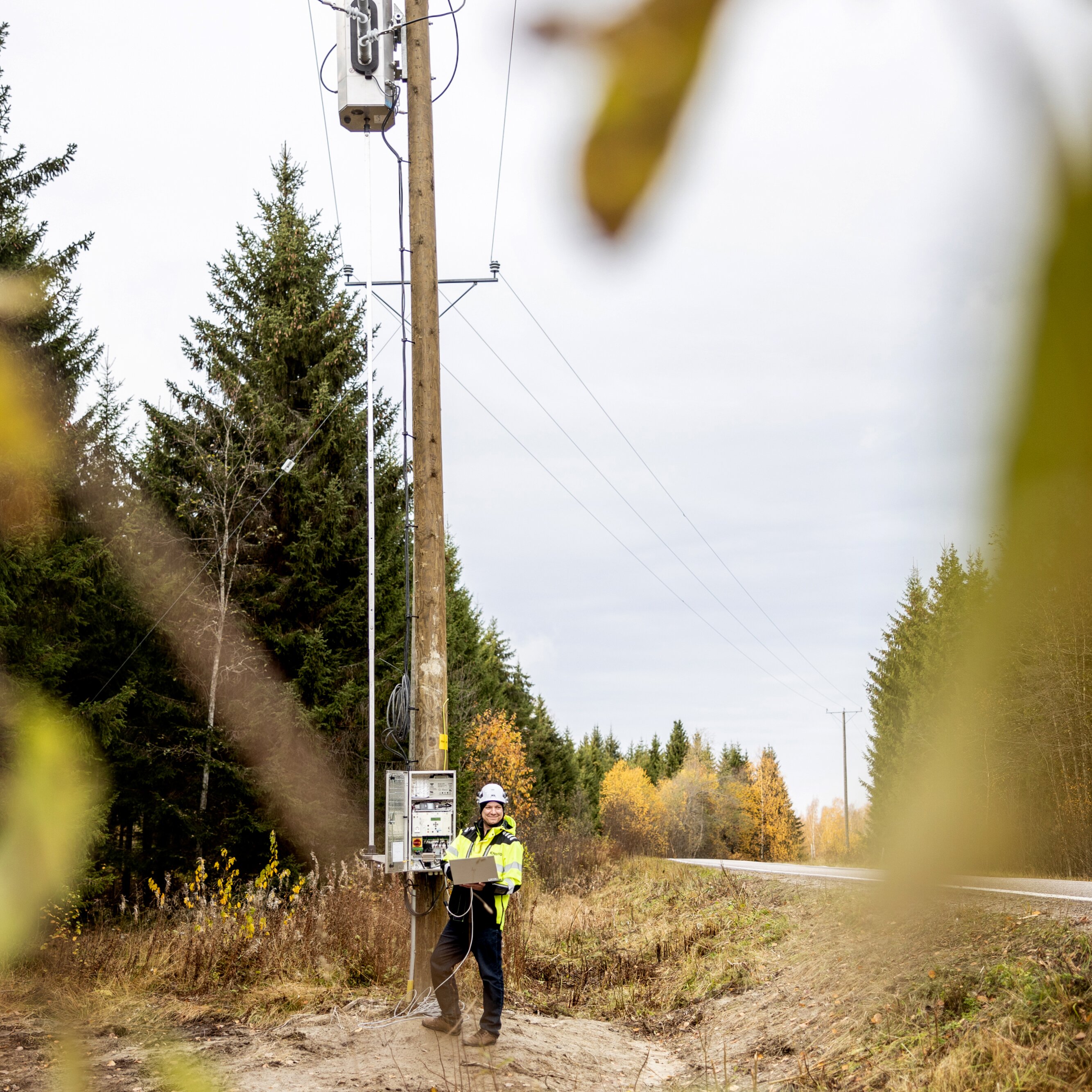 Harri Tuononen at an electricity distribution line.
