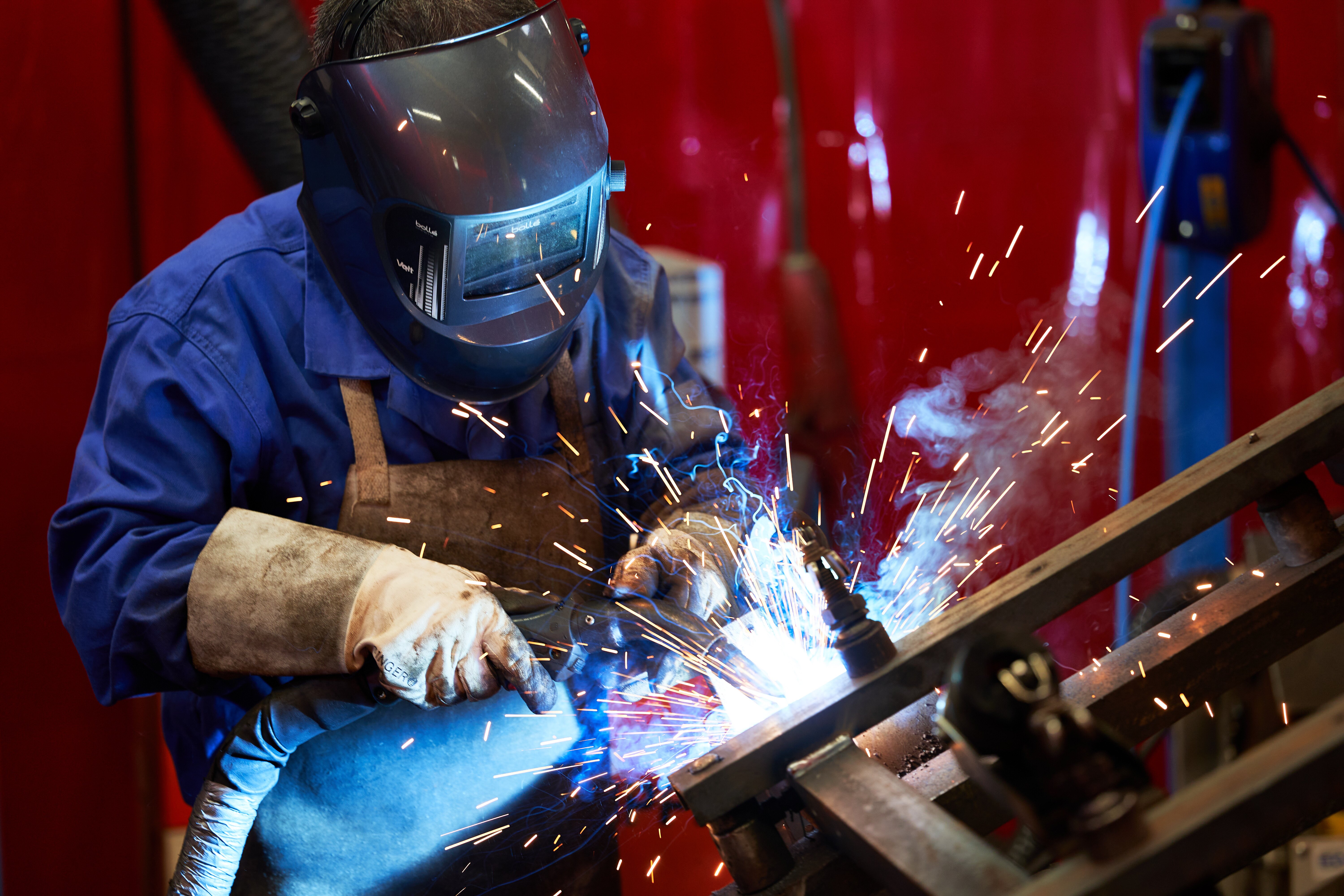 Employee working at Ensto factory in France.