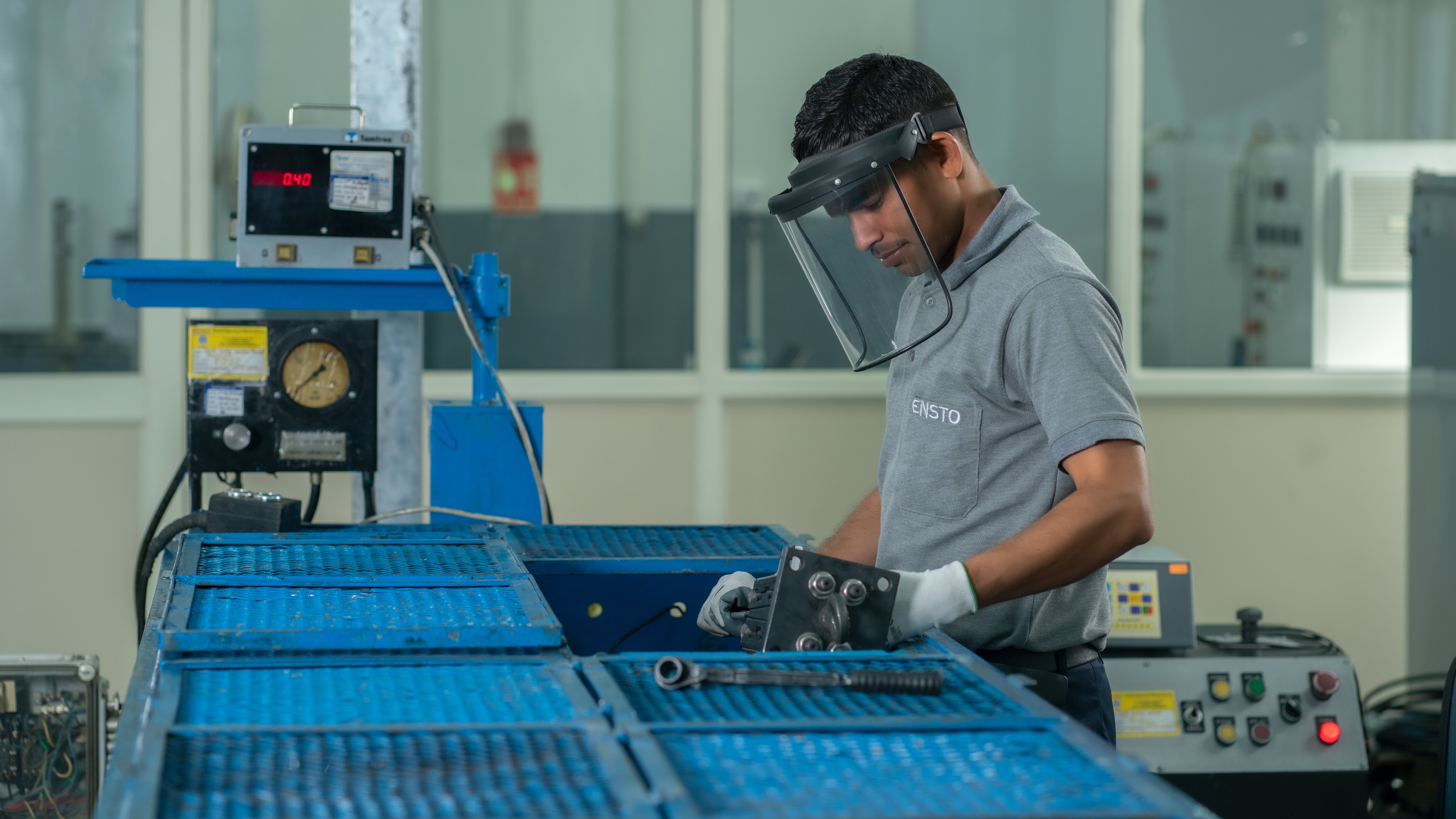 Ensto employee working at Delhi factory.