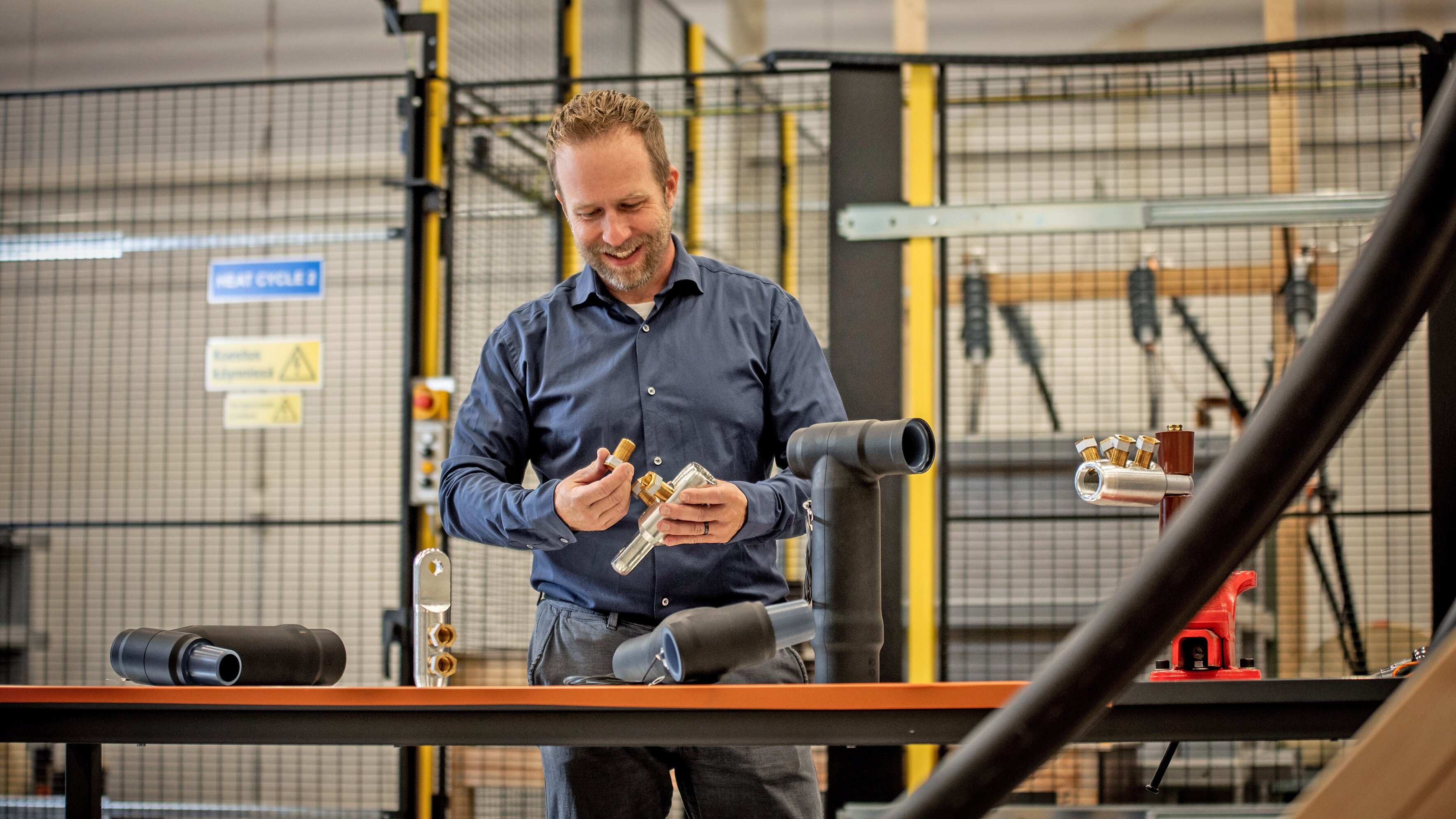 Kenneth Väkeväinen installing Ensto's separable connectors.