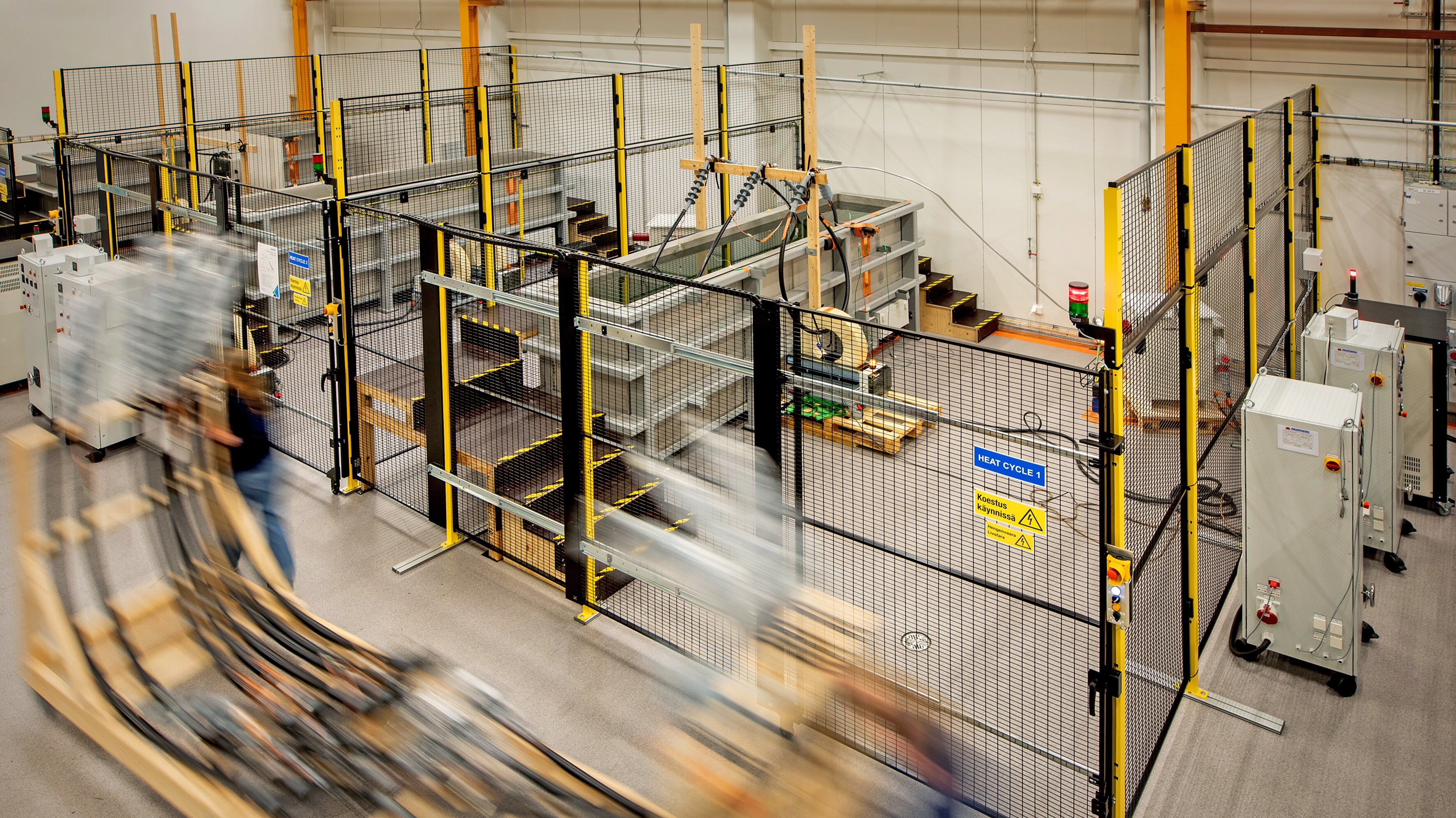 Testing of separable connectors at Ensto Laboratory in Porvoo, Finland.